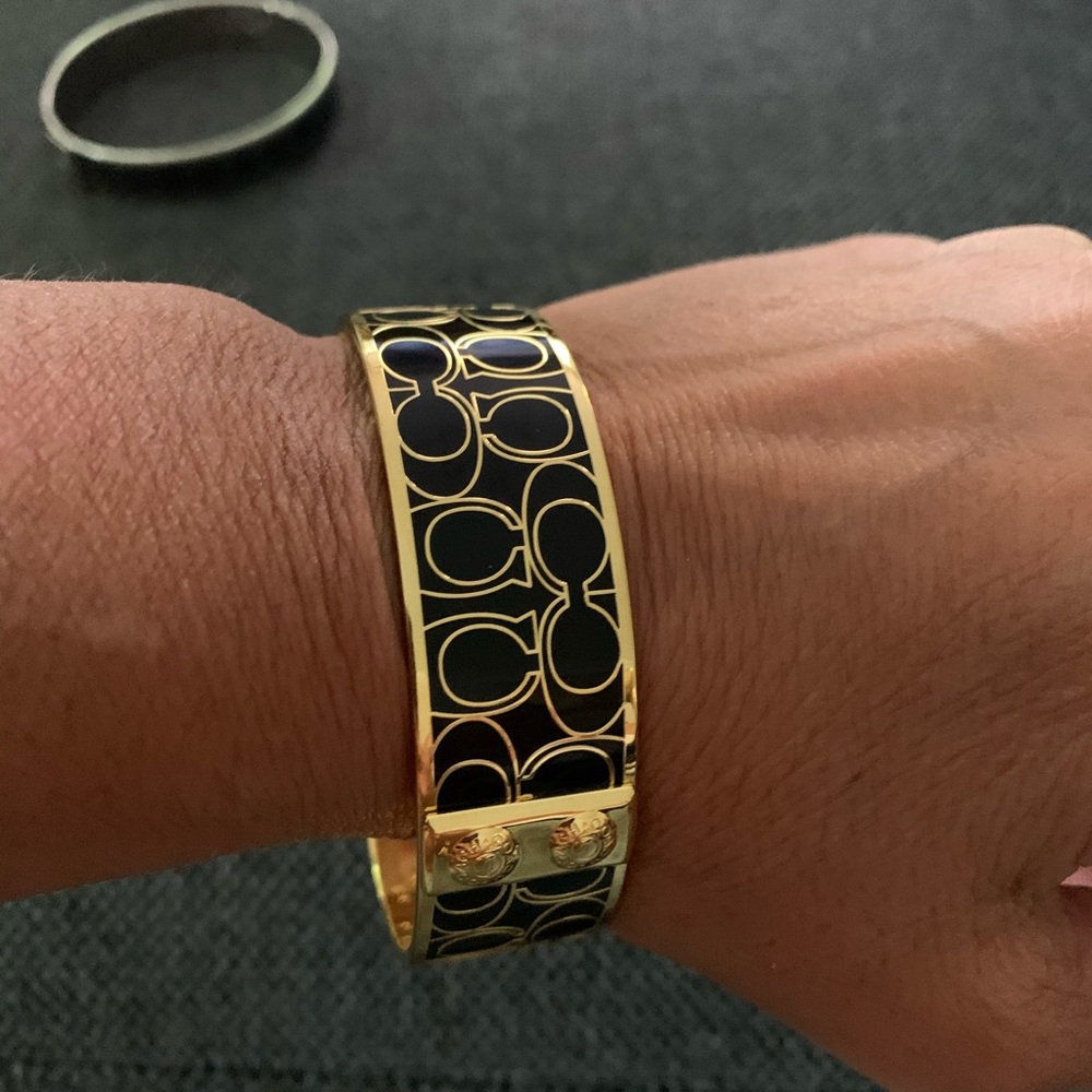 Wide coach black and gold bangle
